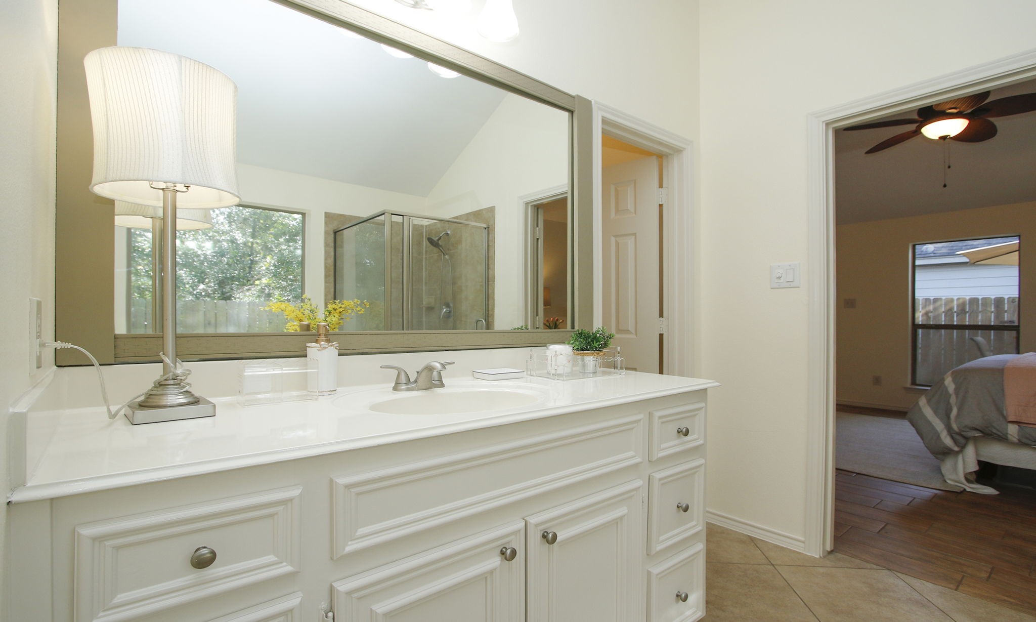 11123 Pembroke Ridge Drive Houston, TX 77065 - Photo 37 of 43 a bathroom with a sink and a mirror