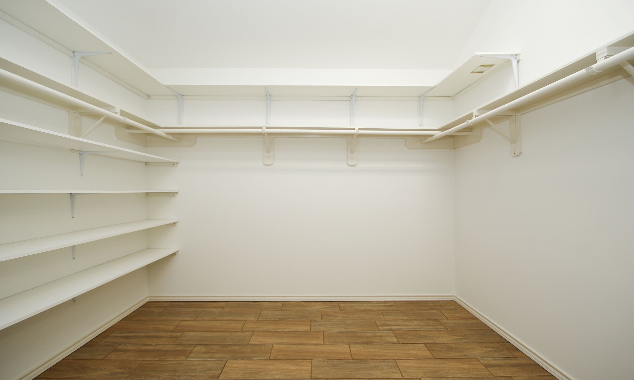 11123 Pembroke Ridge Drive Houston, TX 77065 - Photo 38 of 43 a view of a room with shelf on the wall