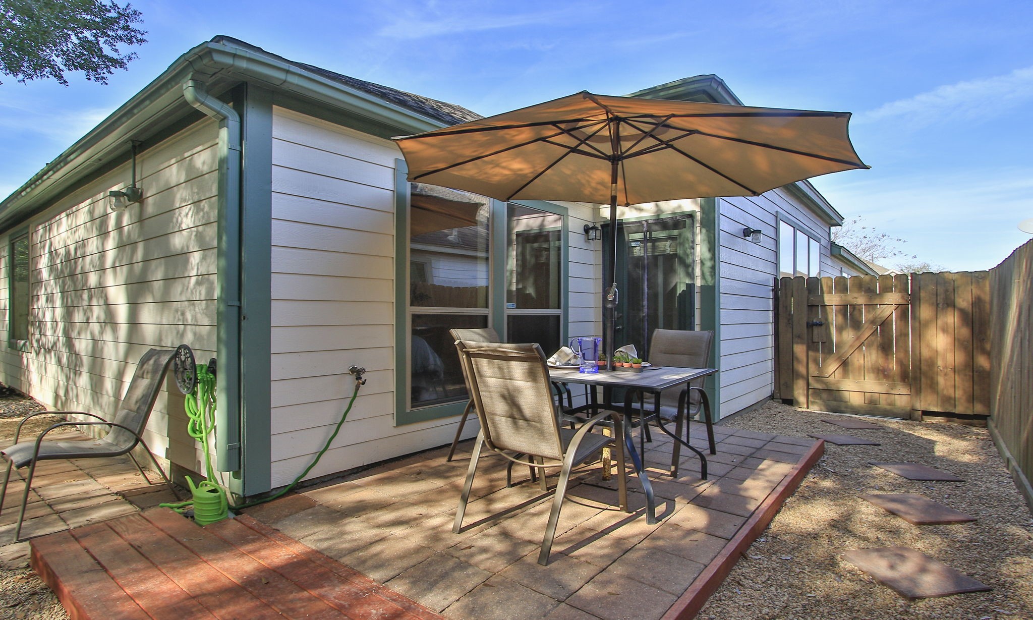 11123 Pembroke Ridge Drive Houston, TX 77065 - Photo 42 of 43 a patio with a patio table and chairs