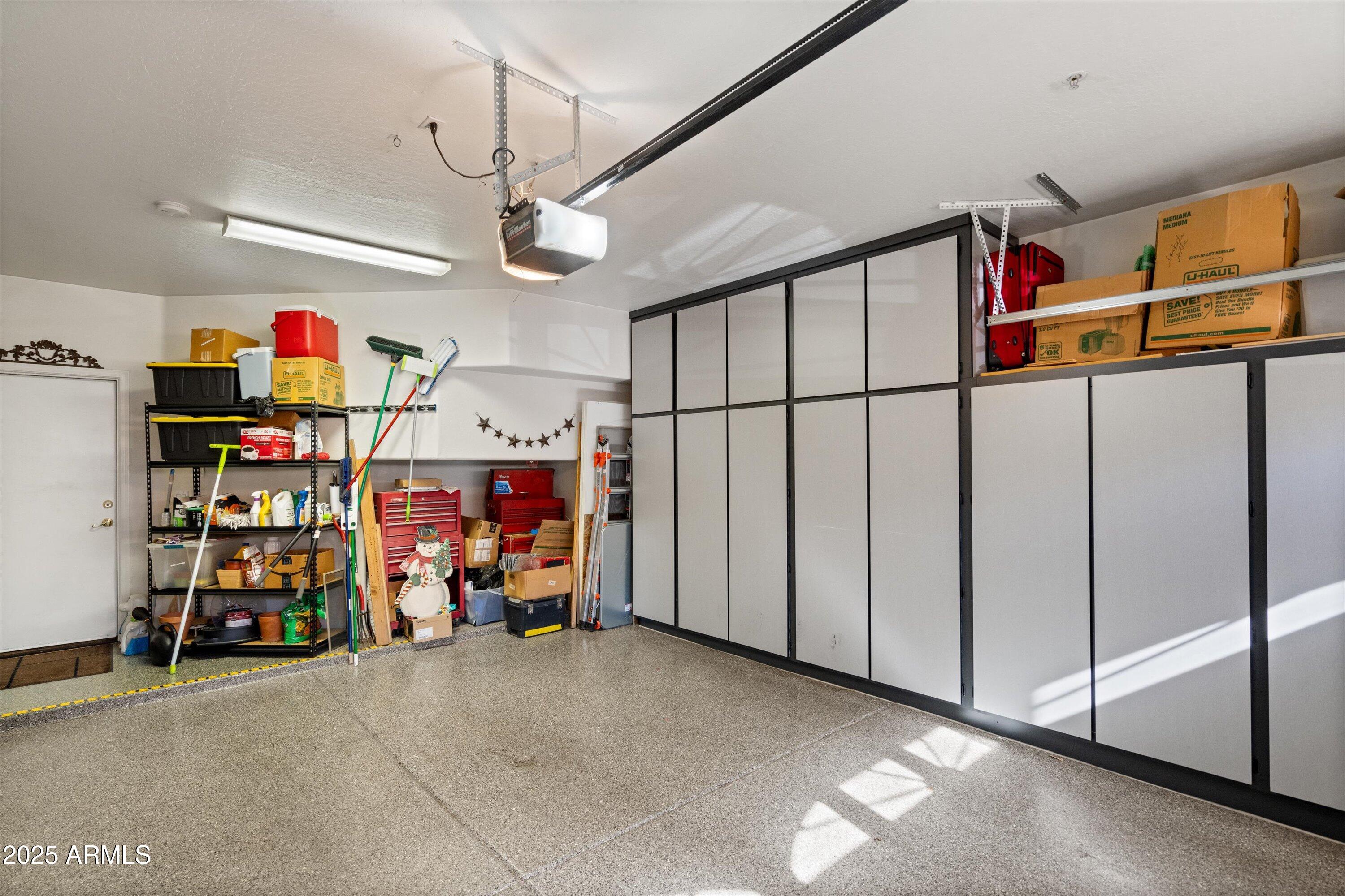 5415 East McKellips Road, Unit 110 Mesa, AZ 85215 - Photo 37 of 43 39-Garage with Custom Cabinets