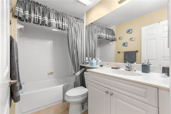 a bathroom with a sink a toilet and a bathtub