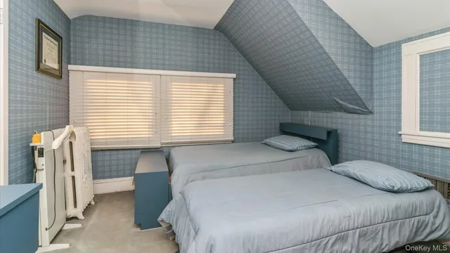 a bedroom with furniture and a couch