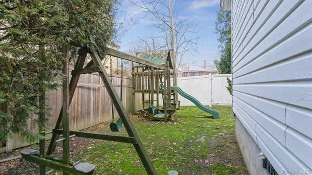 a view of a garden with a slide