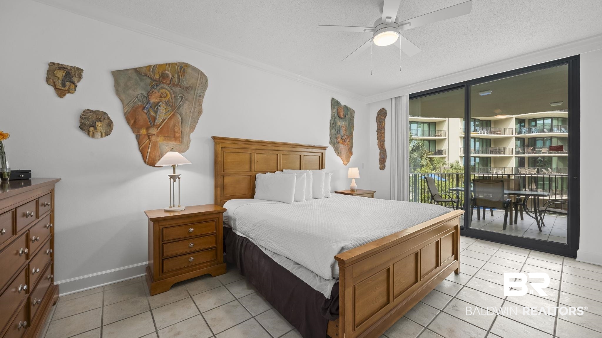 27580 Canal Road, Unit 1213 Orange Beach, AL 36561 - Photo 8 of 27 Bedroom with light-toned tiled flooring and crown molding