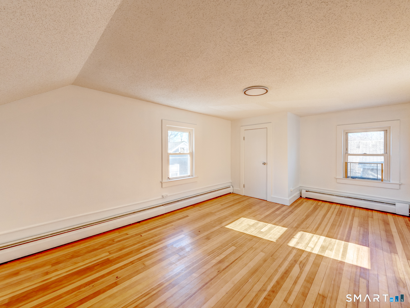 7 Rose Street Norwich, CT 06360 - Photo 32 of 37 a view of an empty room and window
