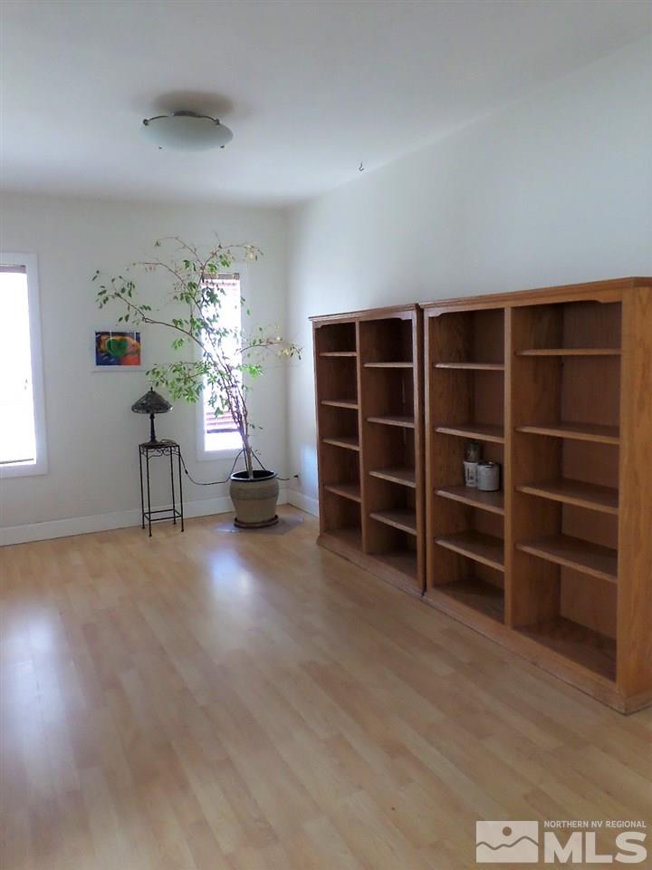 2590 Trentham Way Reno, NV 89509 - Photo 13 of 25 a living room with furniture and wooden floor