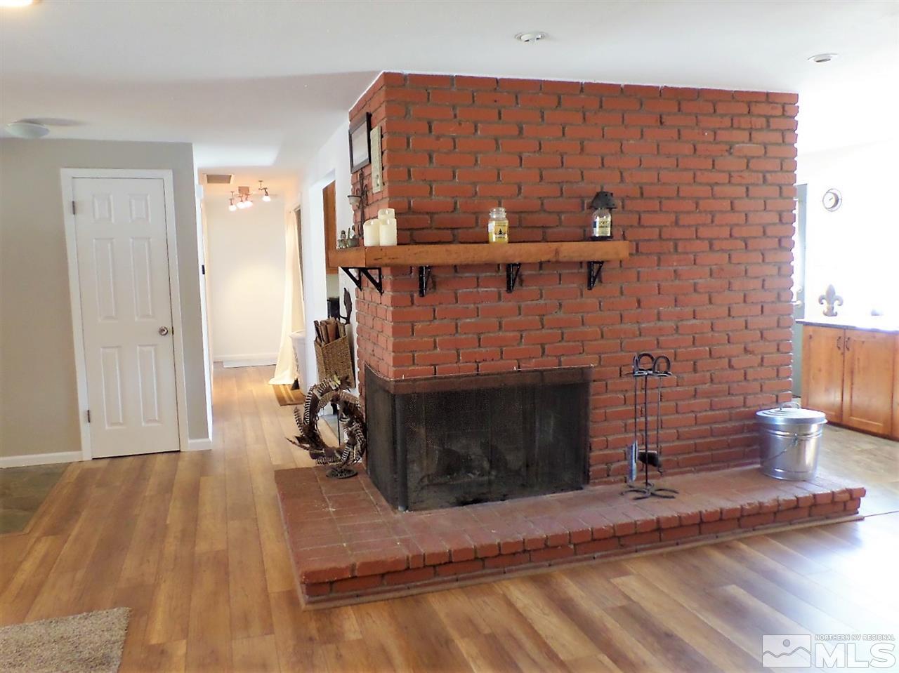 2590 Trentham Way Reno, NV 89509 - Photo 5 of 25 a view of a livingroom with furniture and a fireplace