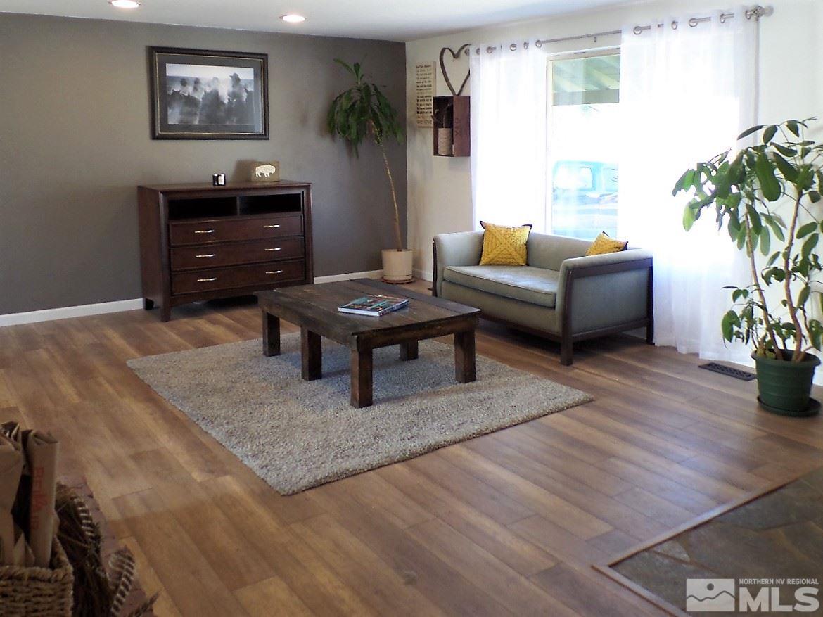 2590 Trentham Way Reno, NV 89509 - Photo 7 of 25 a living room with furniture and a potted plant