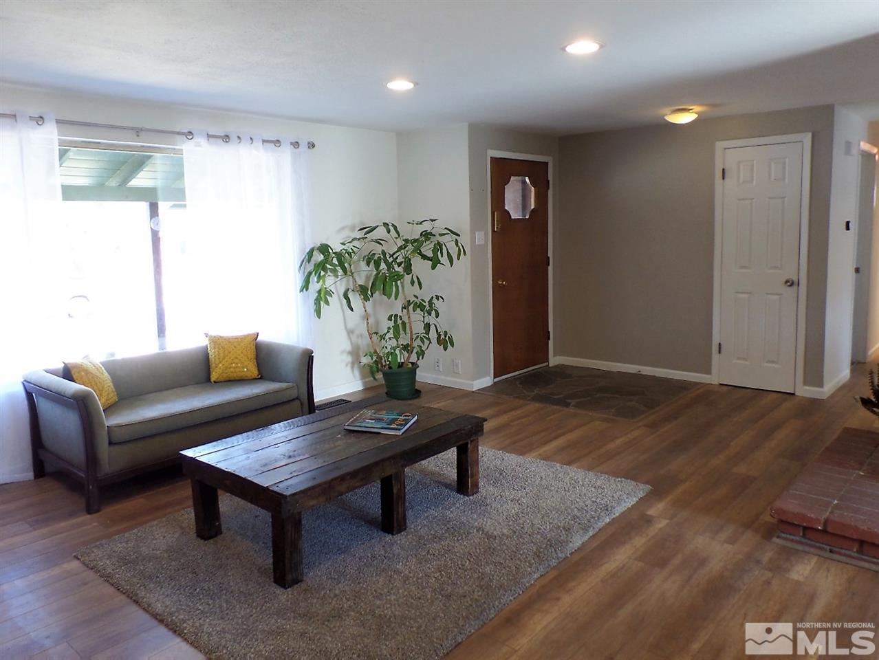 2590 Trentham Way Reno, NV 89509 - Photo 8 of 25 a living room with furniture and a potted plant