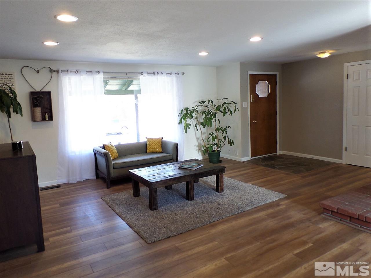 2590 Trentham Way Reno, NV 89509 - Photo 9 of 25 a living room with furniture and a potted plant