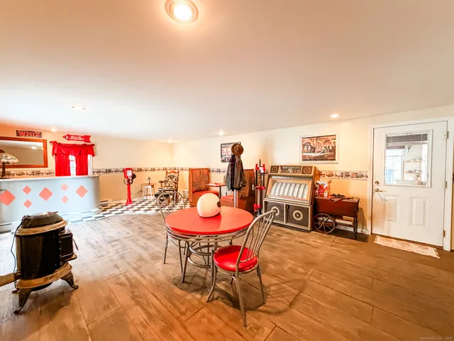 a dining room with a table and chairs