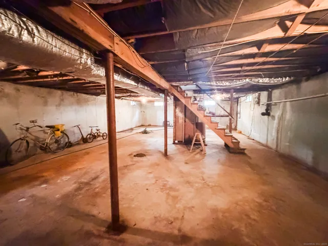 a view of a room with wooden roof