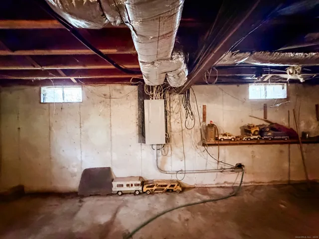 a room with table and chairs