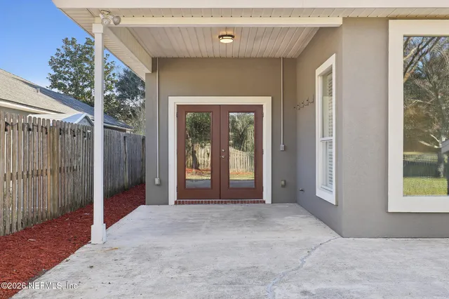 an aerial view of a city with lots of residential buildings