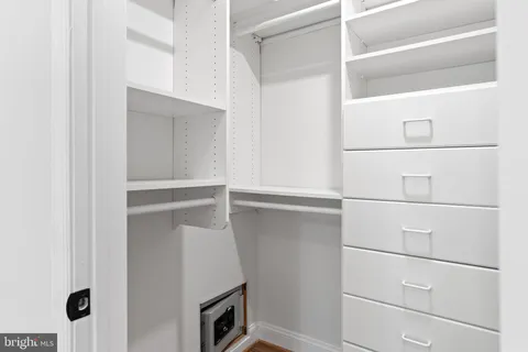 a view of an empty walk in closet