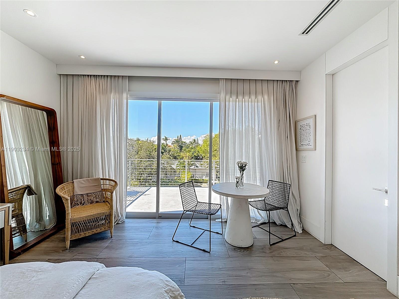 Key Biscayne Key Biscayne, FL 33149 - Photo 22 of 46 a living room with furniture and a large window