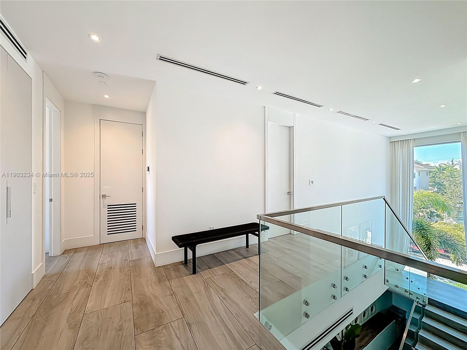 Key Biscayne Key Biscayne, FL 33149 - Photo 34 of 46 a view of an entryway with wooden floor