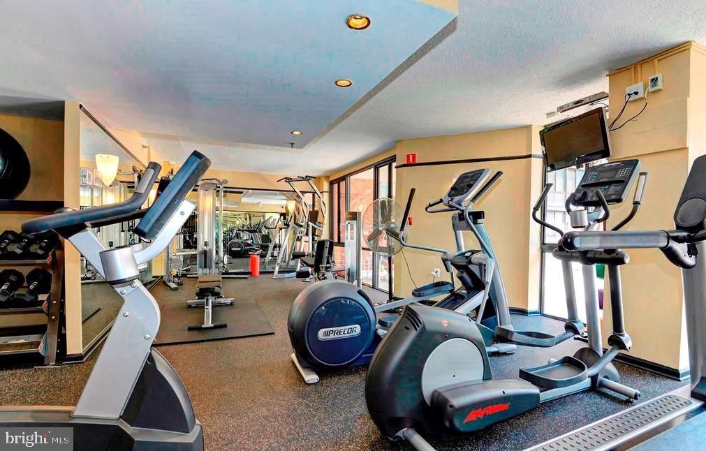 1001 North Randolph Street, Unit 406 Arlington, VA 22201 - Photo 15 of 23 a view of a room with gym equipment