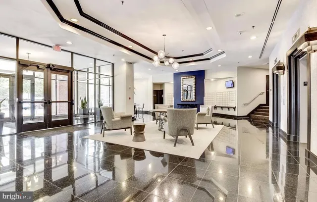 a room with gym equipment and a large window