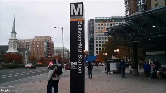 a city street lined with tall buildings
