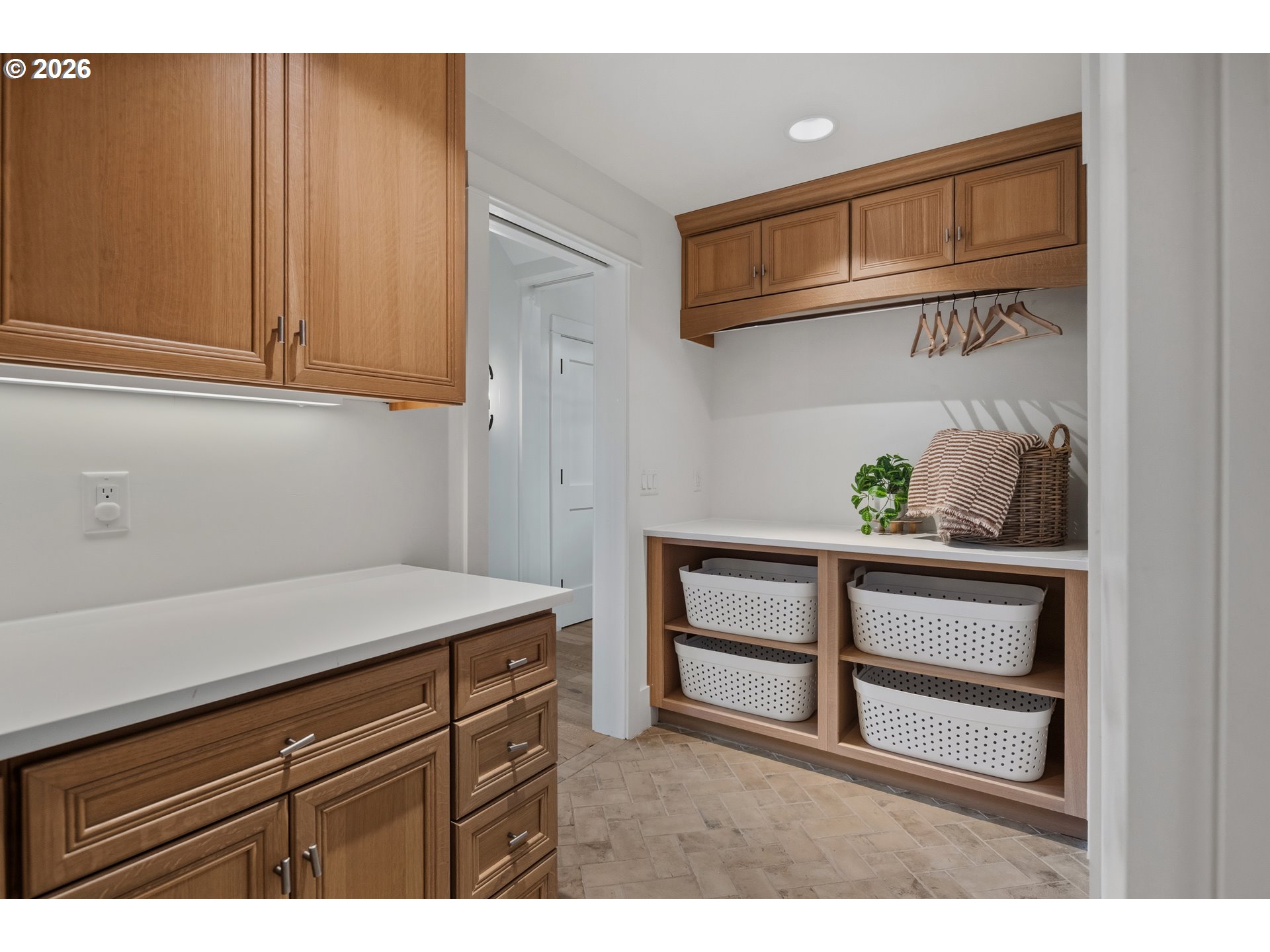 554 Northwest Dawson Ridge Drive Camas, WA 98607 - Photo 29 of 48 a kitchen with a cabinets and potted plant