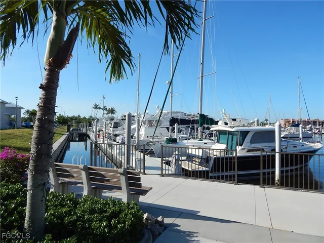 a view of outdoor kitchen and dining area