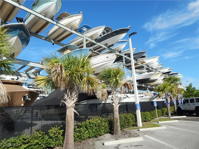 a view of a palm trees front of house