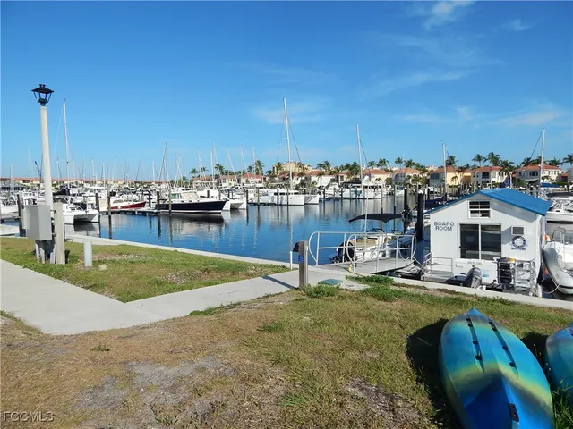 a view of a lake with a house