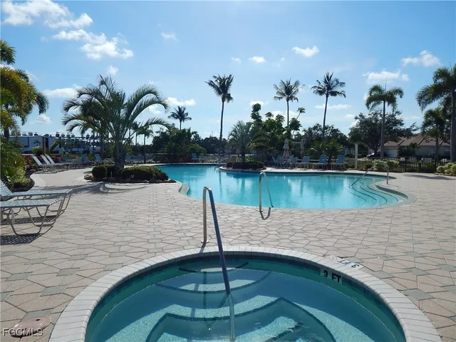 a lake view with a bench in the background