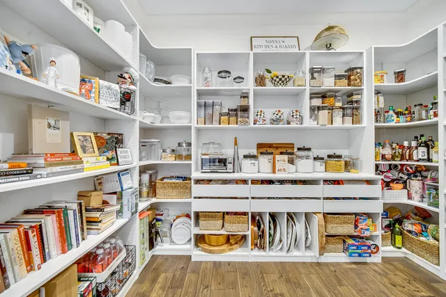 a view of walk in closet with window