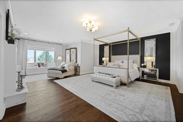 a bathroom with a tub a sink and a shower