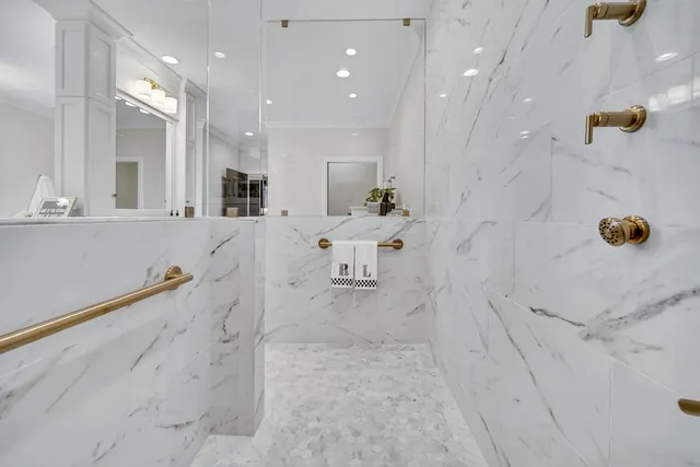 a view of a room with lots of wooden furniture