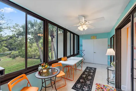 a bedroom with a bed furniture and wooden floor