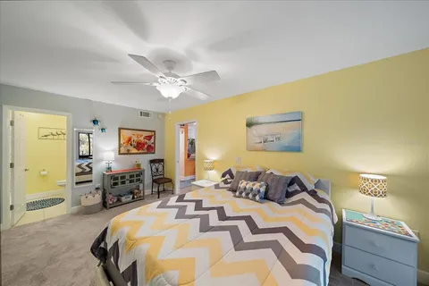 a view of a garden with large trees