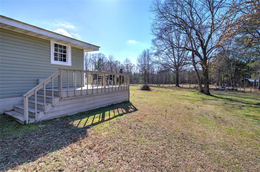 92 South Avery Road Southwest Rome, GA 30165 - Photo 37 of 39 a view of a house with backyard and wooden fence