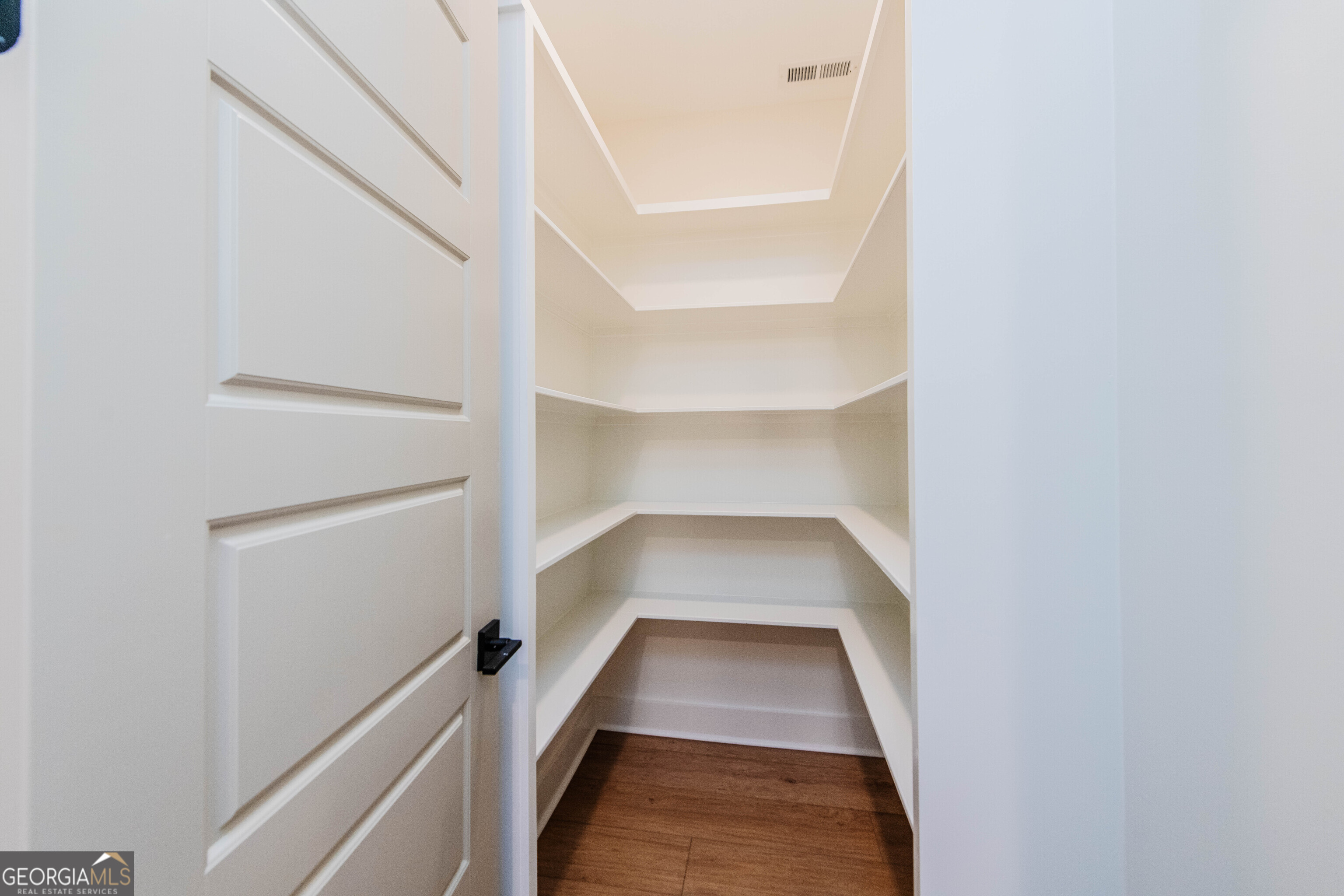 2089 Willow Lake Road Fort Valley, GA 31030 - Photo 12 of 50 a view of walk in closet with empty racks