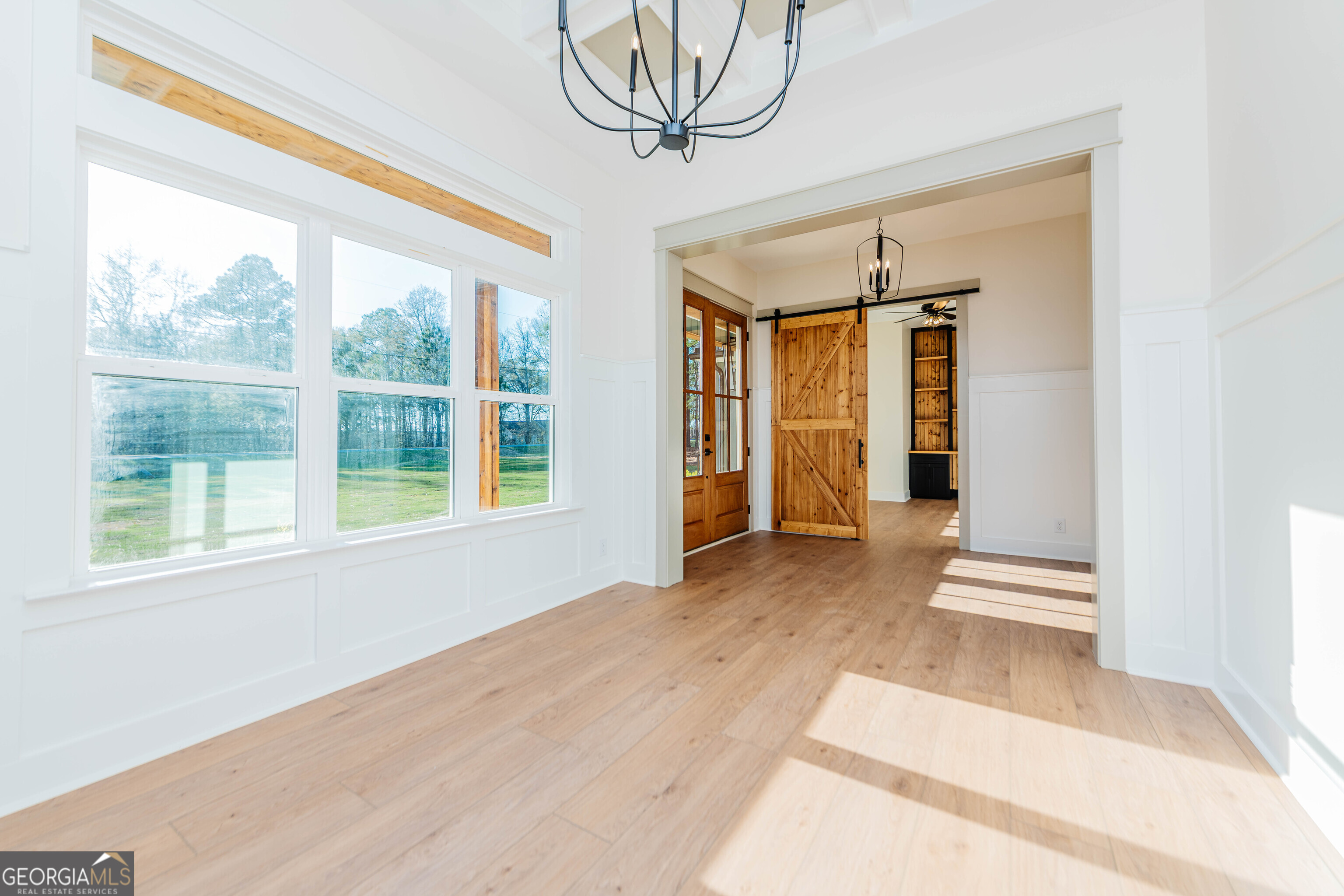 2089 Willow Lake Road Fort Valley, GA 31030 - Photo 2 of 50 a view of an empty room with a window