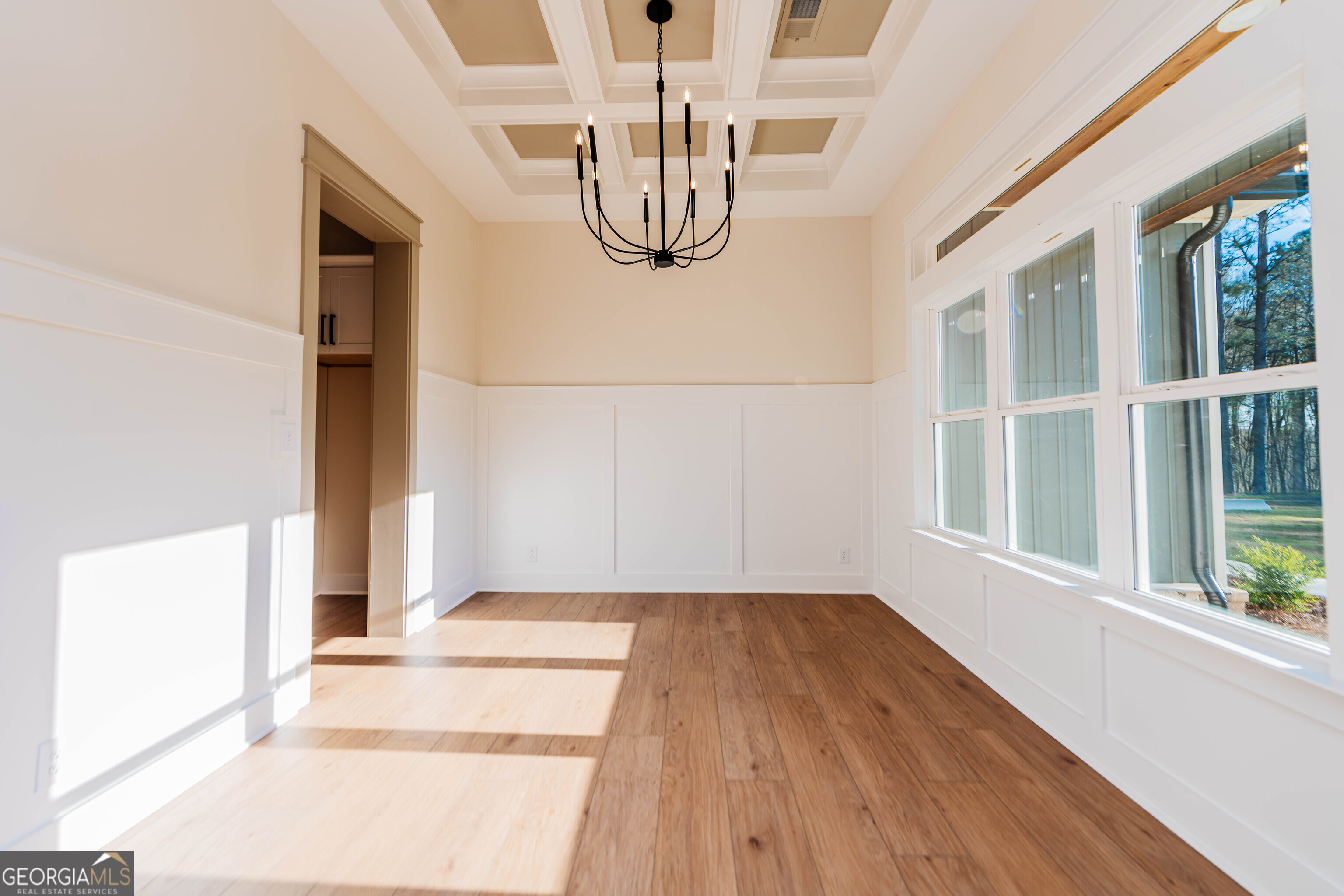 2089 Willow Lake Road Fort Valley, GA 31030 - Photo 3 of 50 a view of empty room with wooden floor and fan
