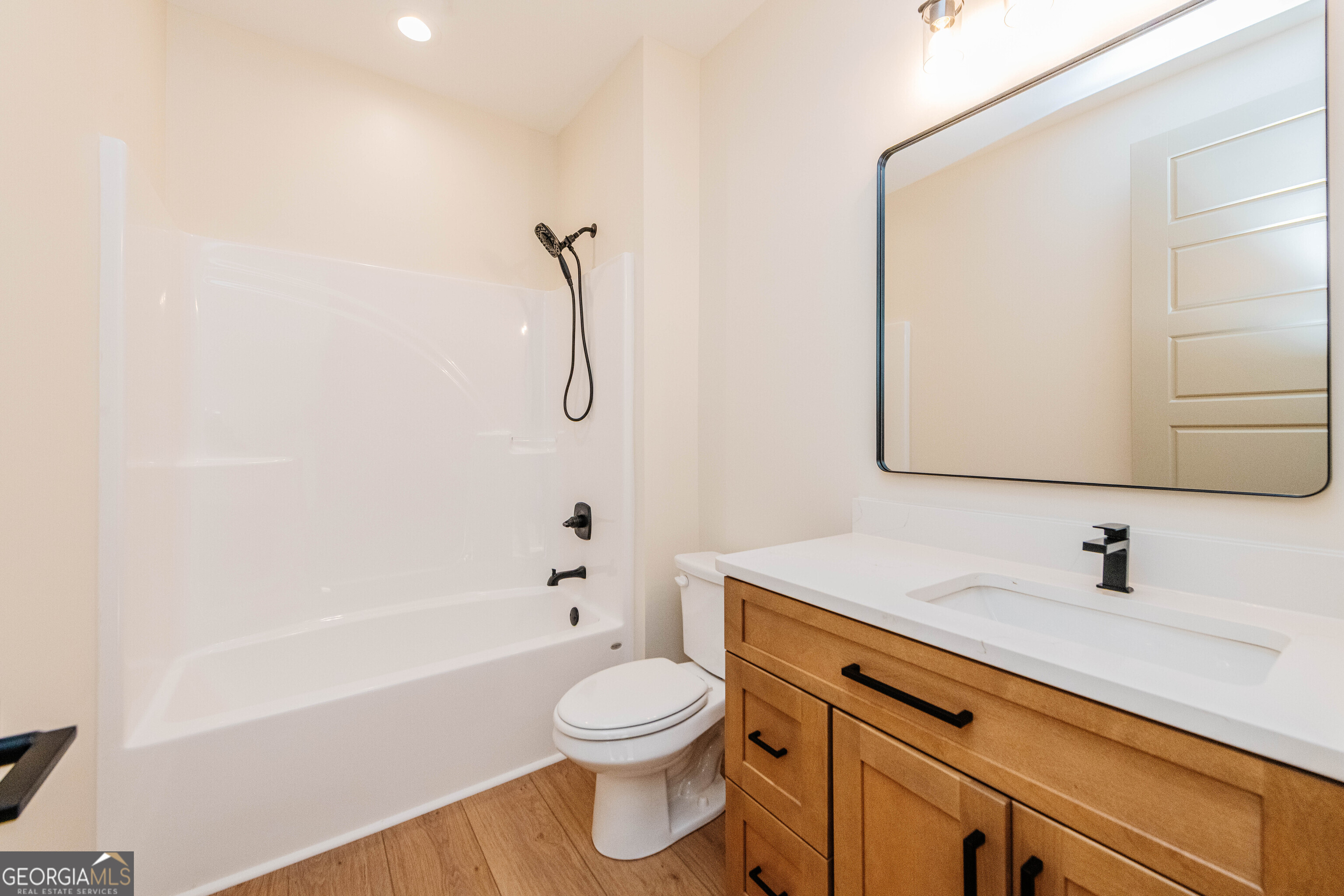 2089 Willow Lake Road Fort Valley, GA 31030 - Photo 40 of 50 a bathroom with a sink a toilet and shower