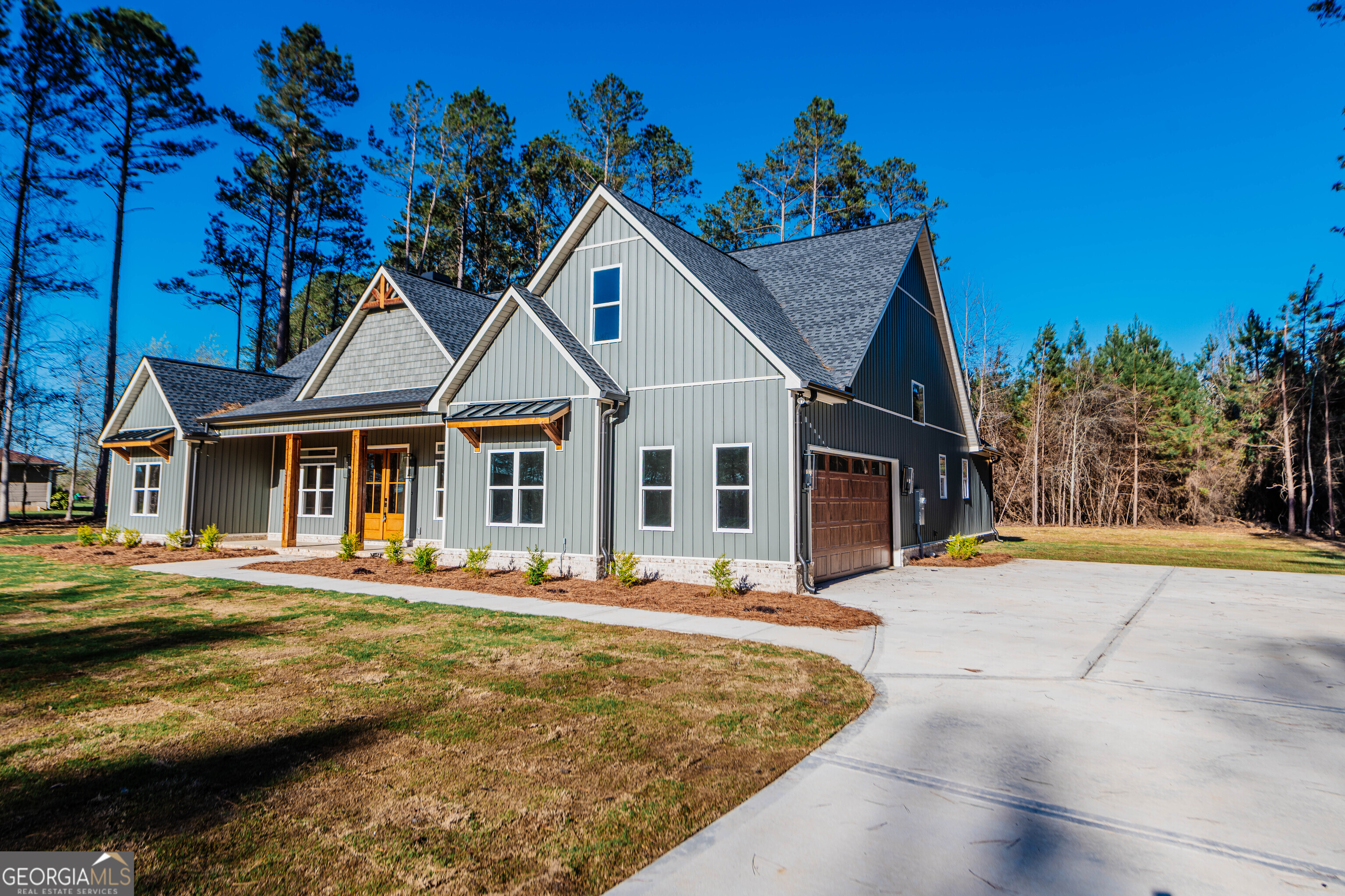 2089 Willow Lake Road Fort Valley, GA 31030 - Photo 49 of 50 a front view of a house with a yard