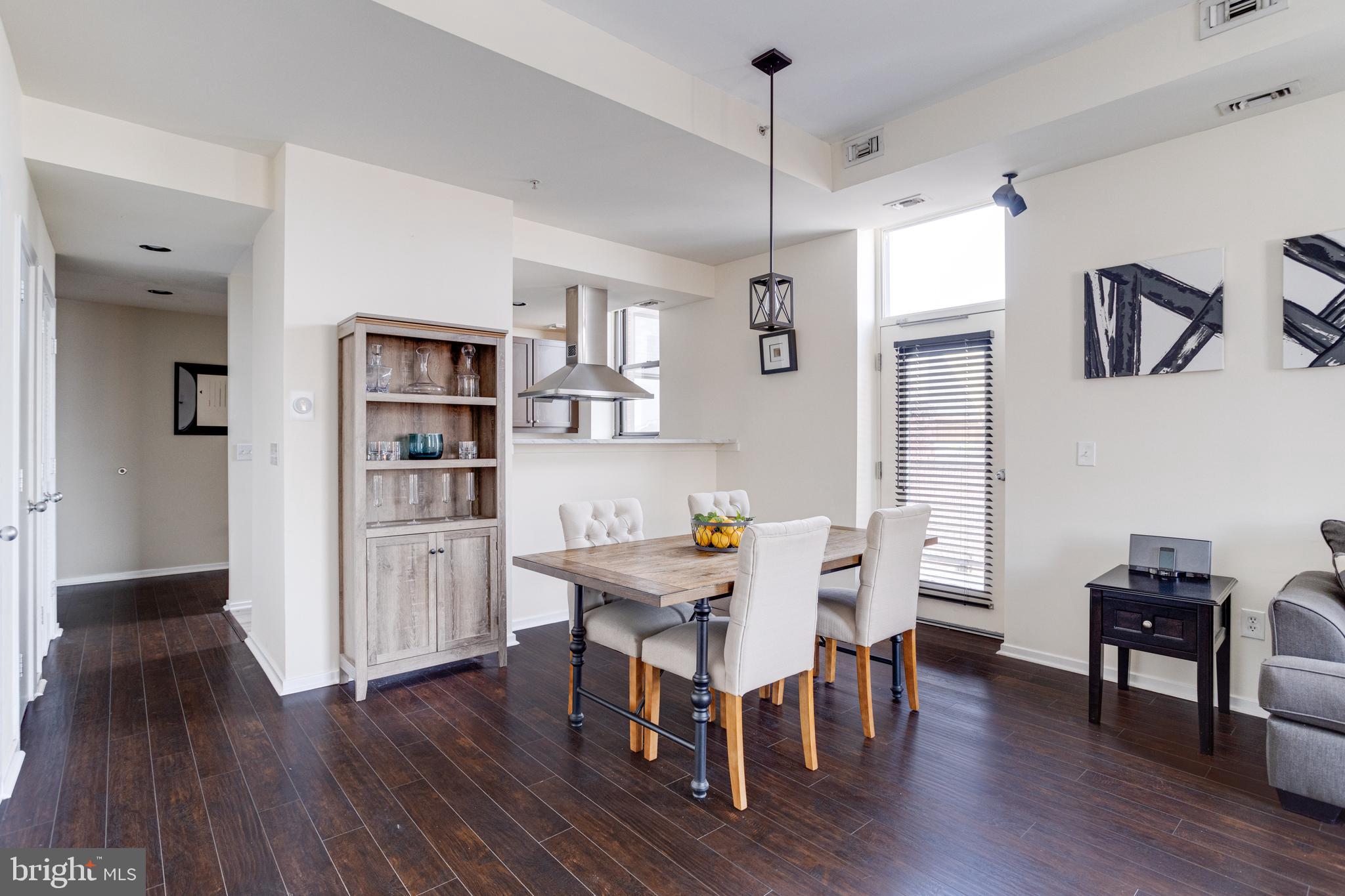 1211 Light Street, Unit 403 Baltimore, MD 21230 - Photo 11 of 52 Dining Area w/ Open Layout / Hardwood Flooring