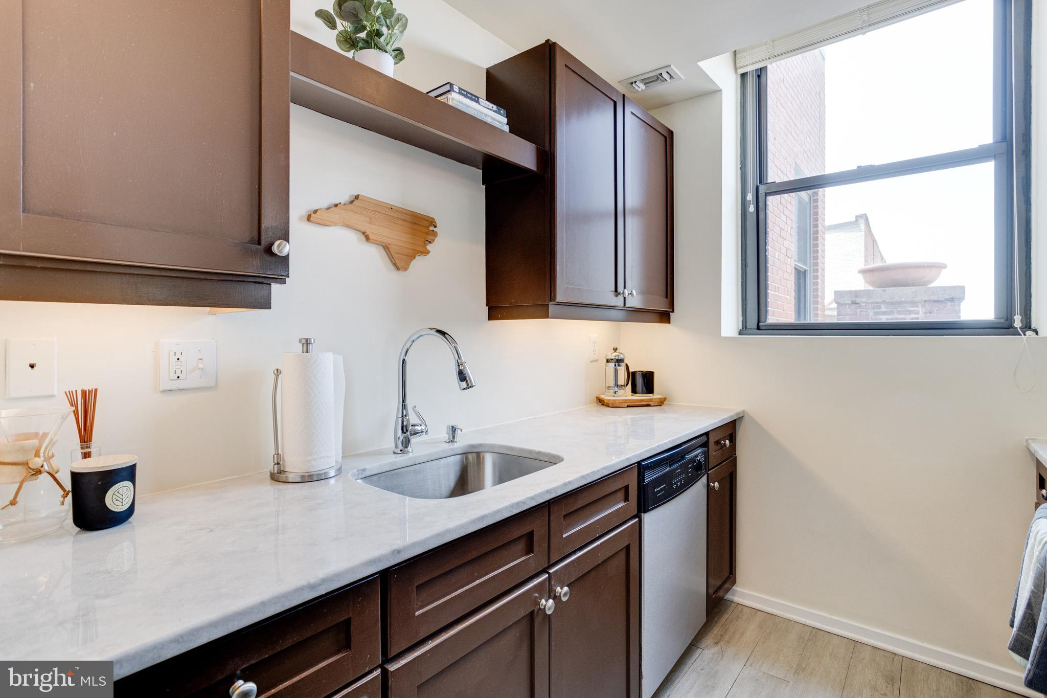 1211 Light Street, Unit 403 Baltimore, MD 21230 - Photo 14 of 52 Kitchen with quartz countertops / SS Appliances