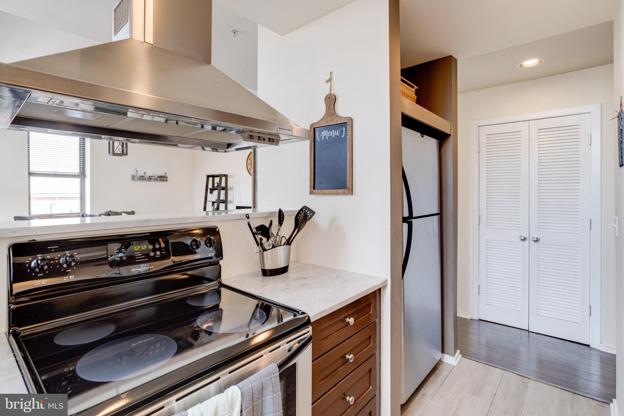 1211 Light Street, Unit 403 Baltimore, MD 21230 - Photo 17 of 52 Kitchen with quartz countertops / SS Appliances