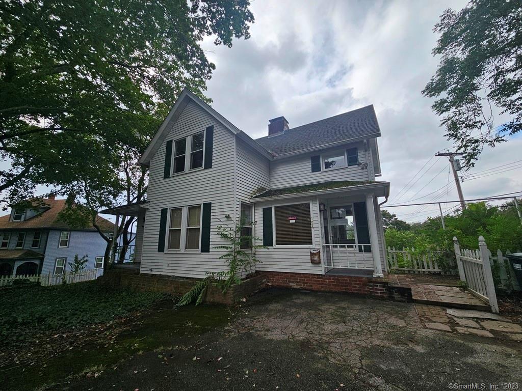 154 Walker Hill Road Groton, CT 06340 - Photo 1 of 1 a house view with a garden space