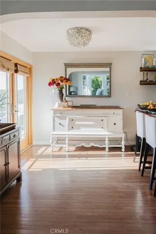 front view of house with potted plants