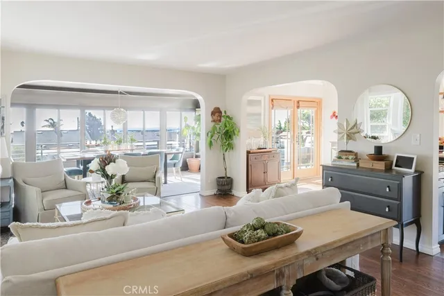 a view of furniture and mirror in a room