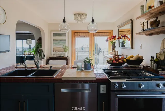 a view of front door with washer and dryer