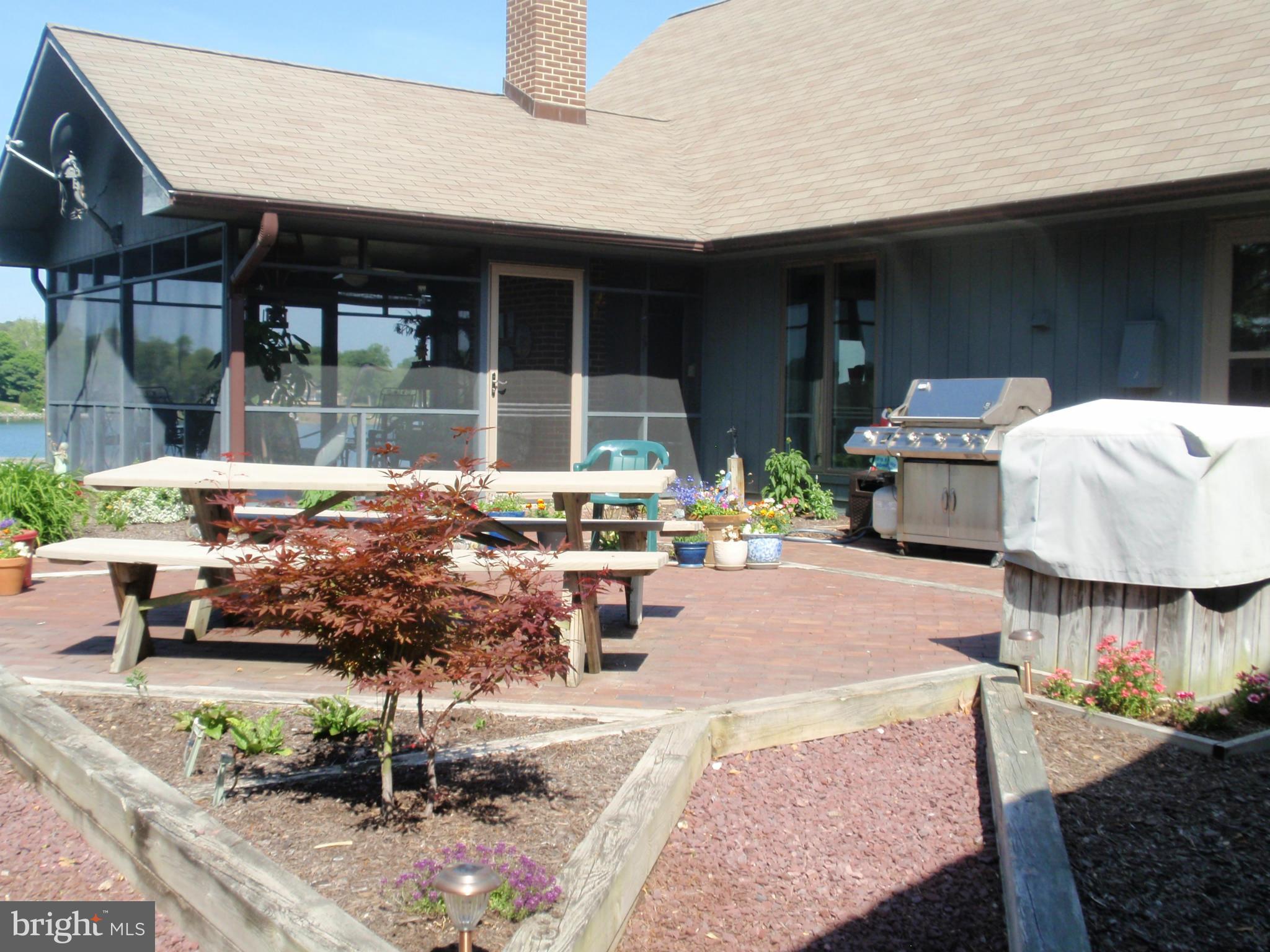 24468 Half Pone Point Road Hollywood, MD 20636 - Photo 11 of 28 Party patio..grill and crab cooker