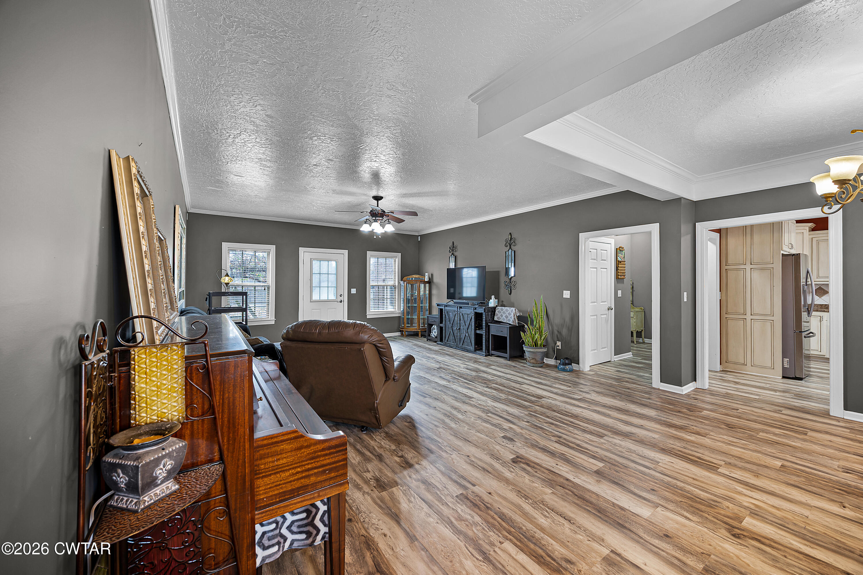 31 Turkey Creek Road Medina, TN 38355 - Photo 10 of 30 a living room with furniture a flat screen tv and large window