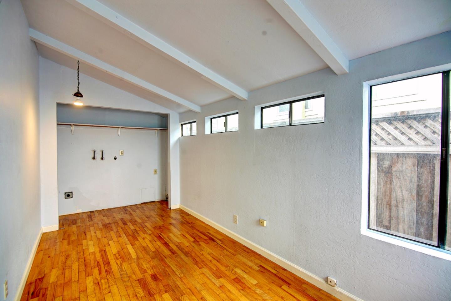 2395 Delaware Avenue, Unit 63 Santa Cruz, CA 95060 - Photo 14 of 16 a bedroom with a bed and a window